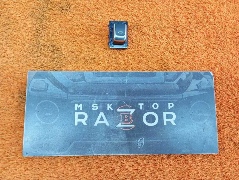 Кнопка стеклоподъемника