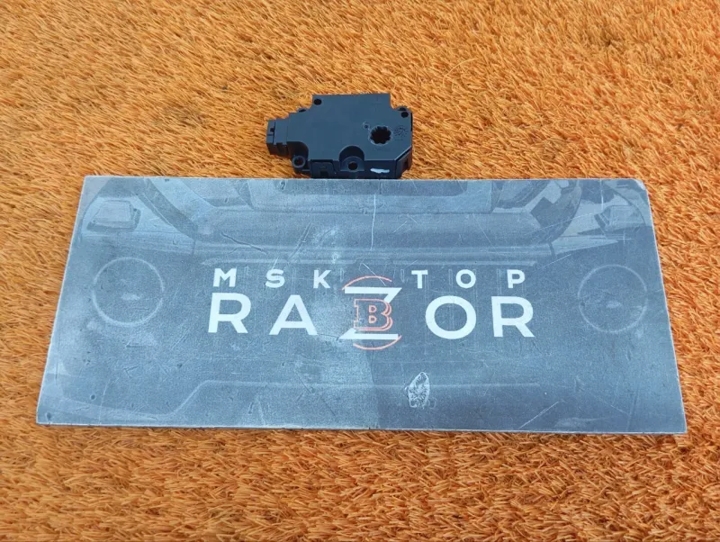 Сервопривод заслонок печки