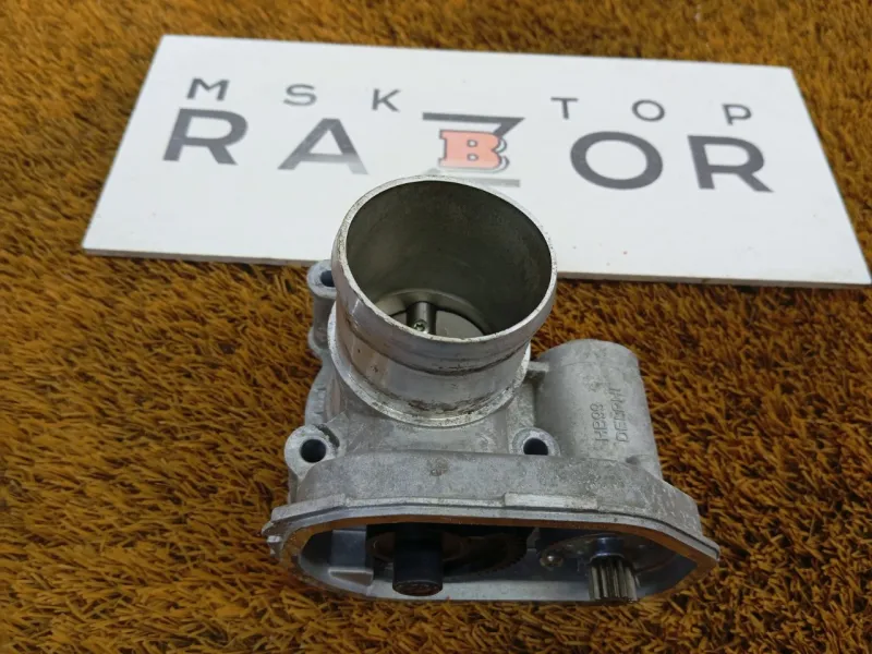 Дроссельная заслонка