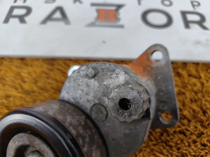 Натяжитель приводного ремня