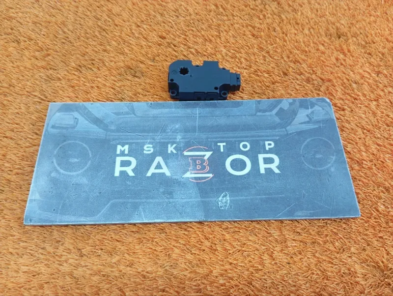 Сервопривод заслонок печки