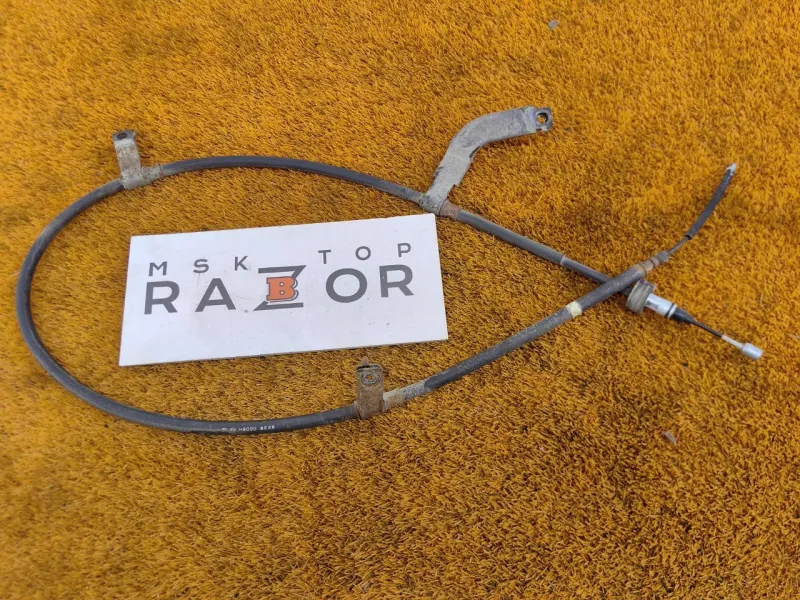 Трос стояночного тормоза