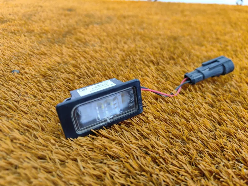 Фонарь подсветки номера