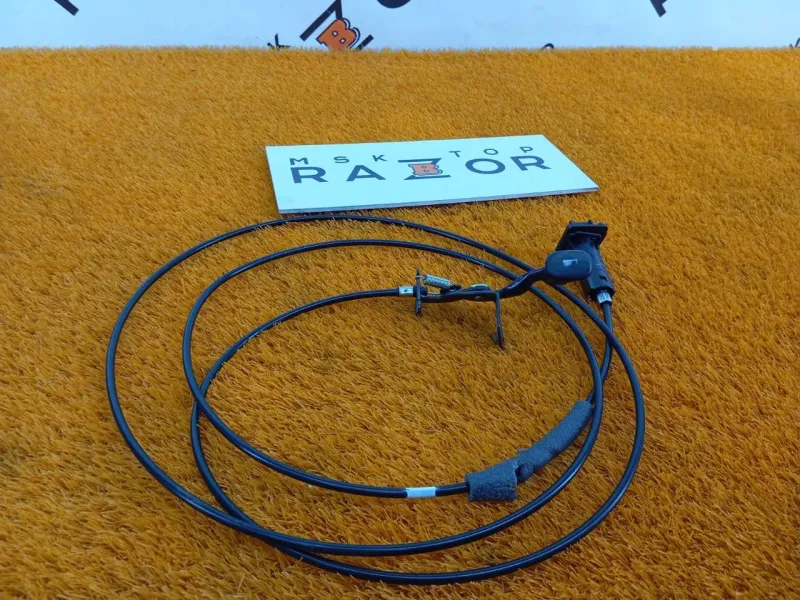 Трос лючка топливного бака