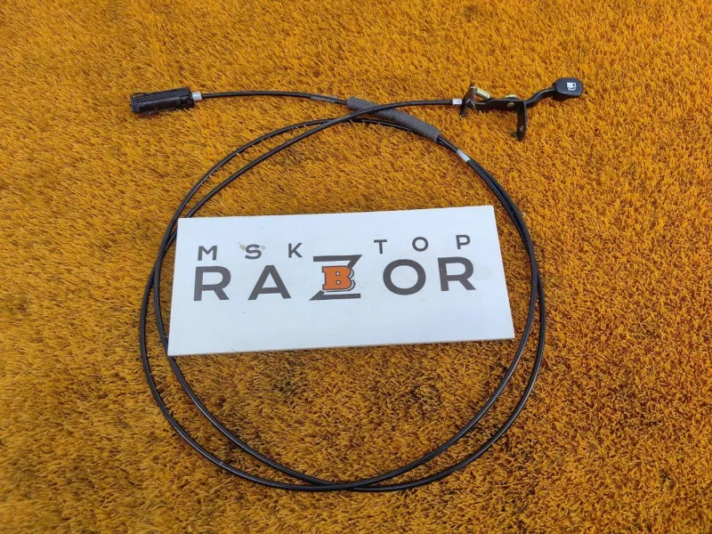 Трос лючка топливного бака