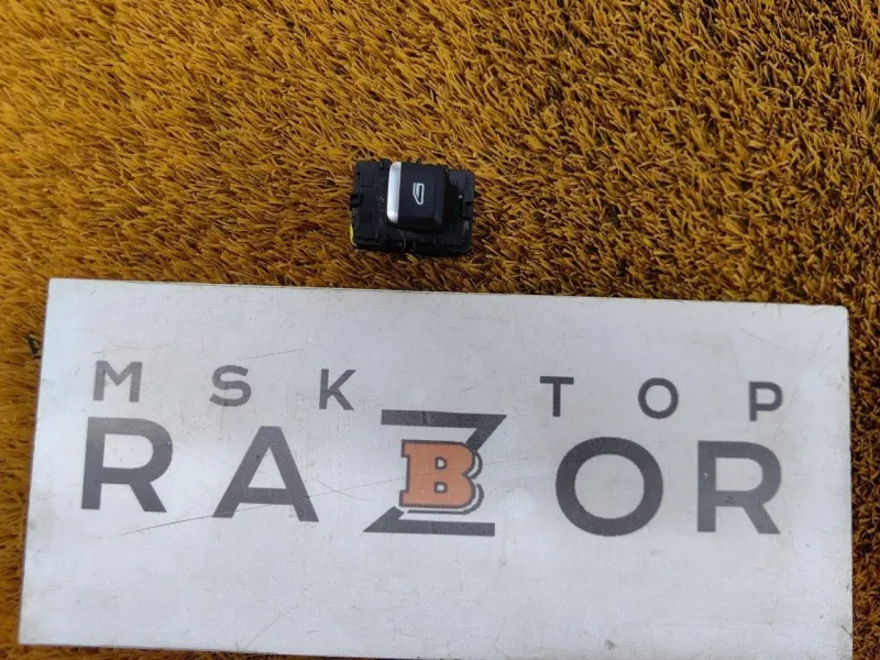 Кнопка стеклоподъемника