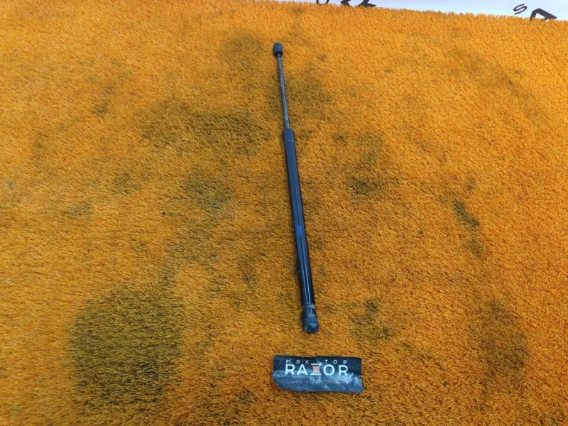 Амортизатор крышки багажника