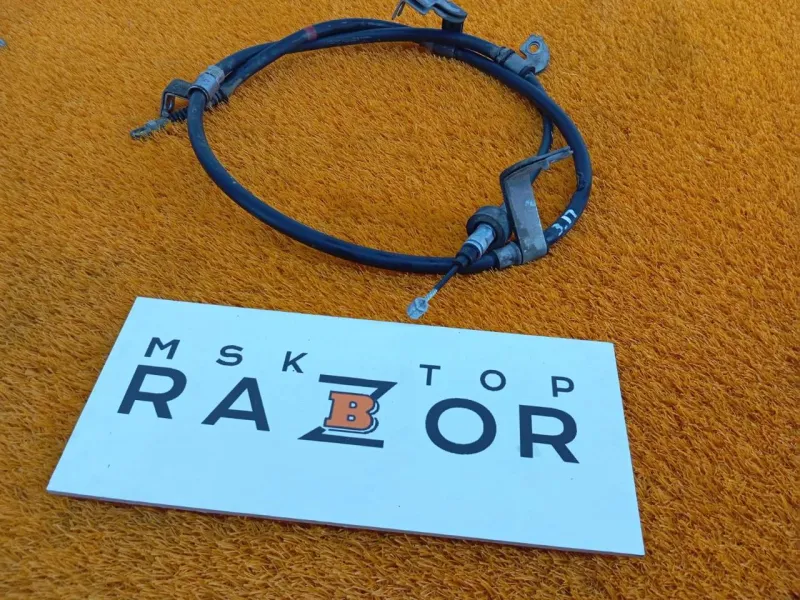 Трос стояночного тормоза