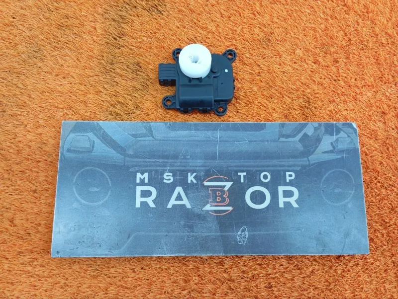 Сервопривод заслонок печки