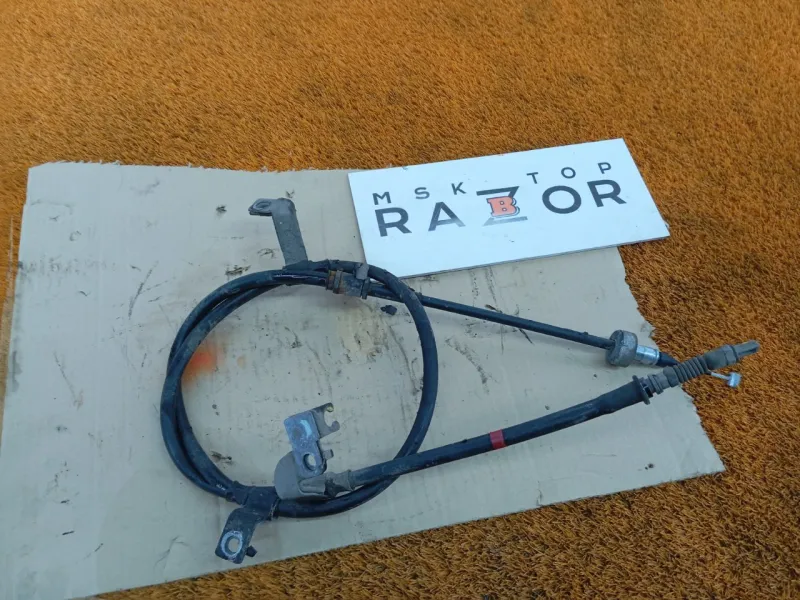 Трос стояночного тормоза