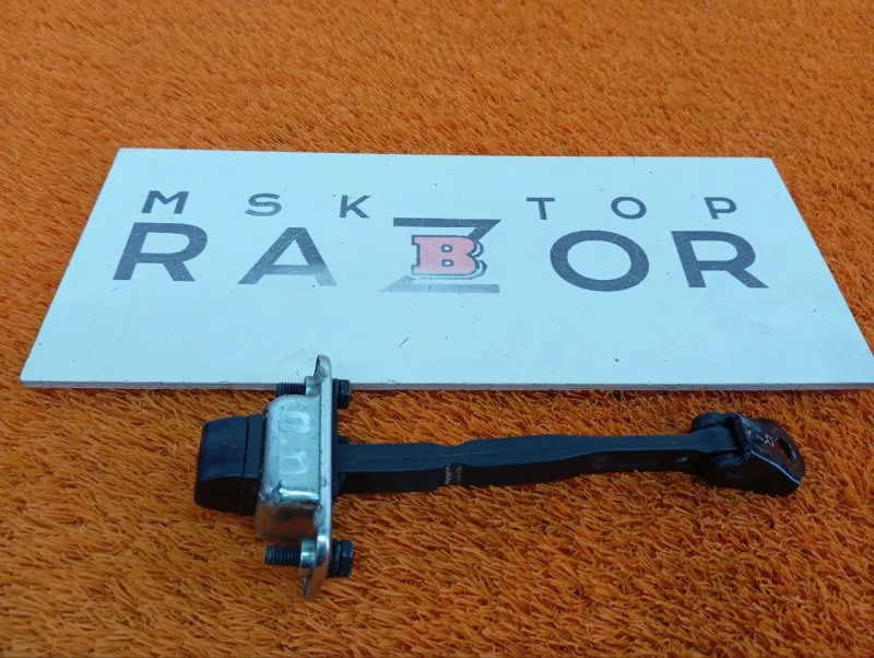 Ограничитель двери