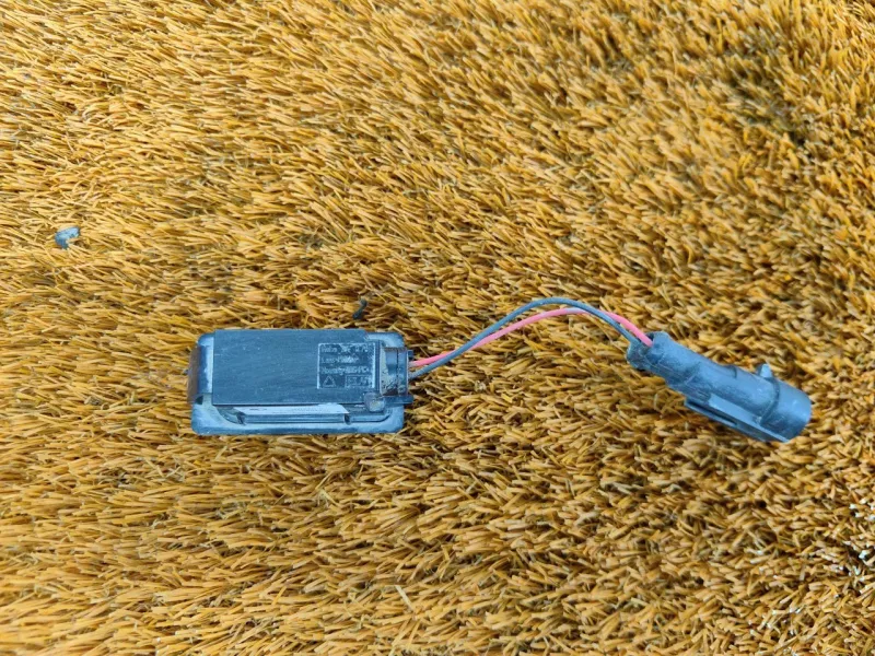 Фонарь подсветки номера