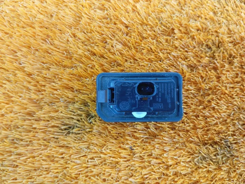 Фонарь подсветки номера