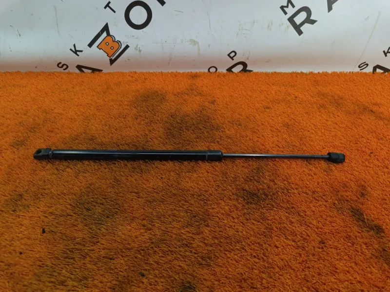 Амортизатор крышки багажника