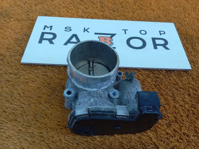 Дроссельная заслонка