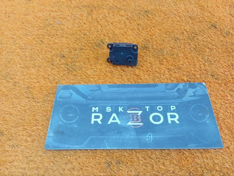 Сервопривод заслонок печки