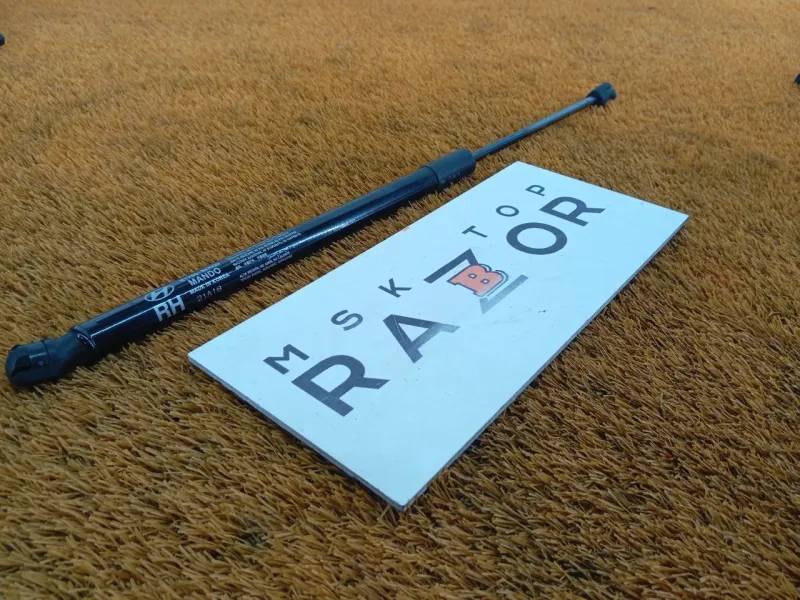 Амортизатор крышки багажника