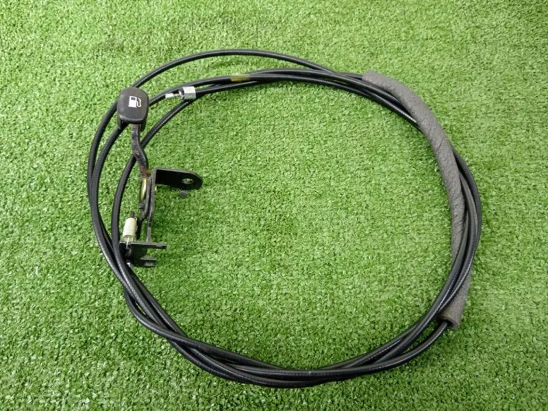 Трос лючка топливного бака