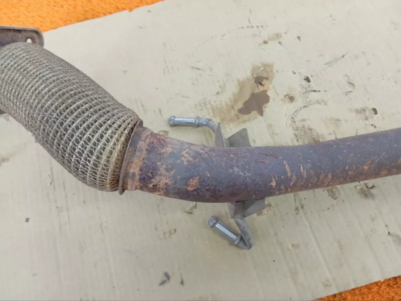 Приемная труба глушителя