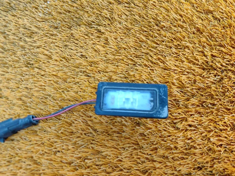 Фонарь подсветки номера