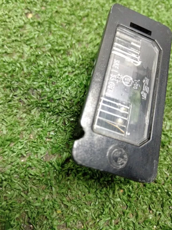 Фонарь подсветки номера