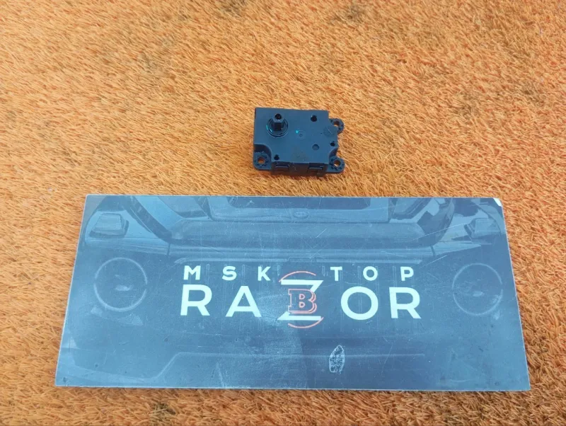 Сервопривод заслонок печки