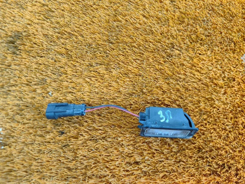 Фонарь подсветки номера