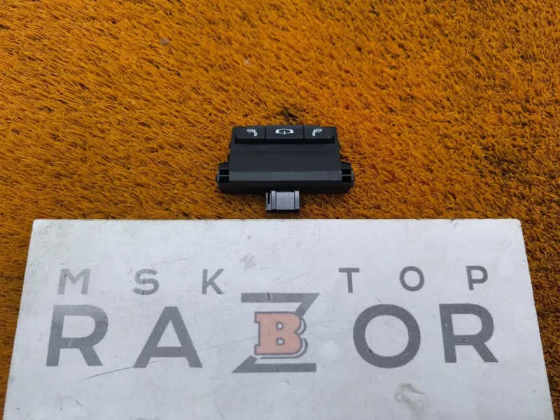 Кнопка обогрева сидений