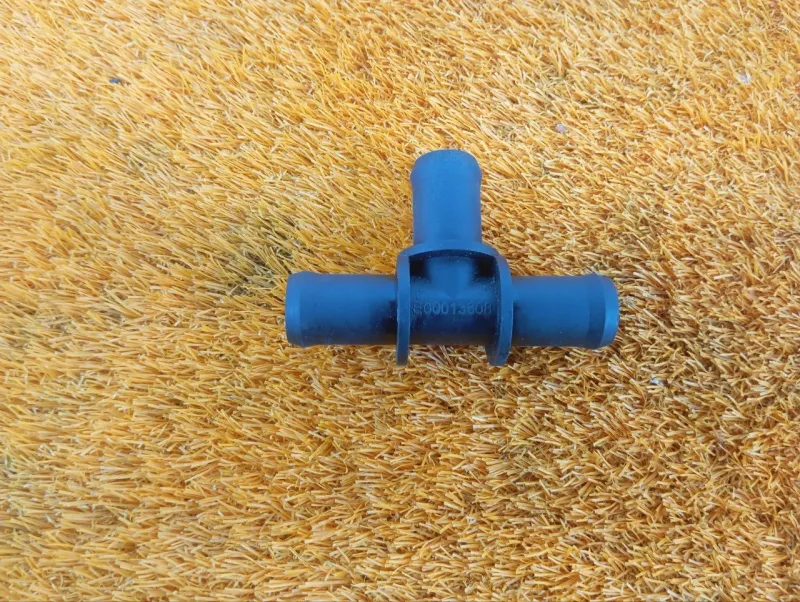 Тройник патрубков печки