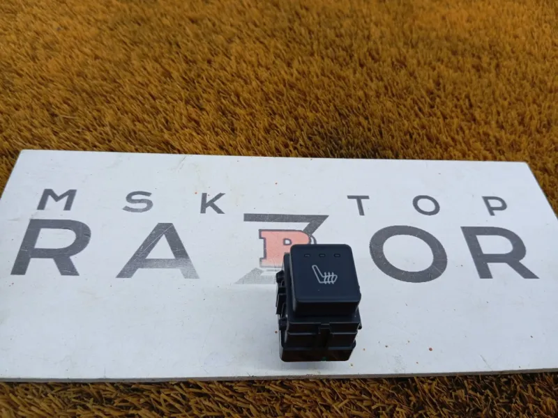 Кнопка обогрева сидений