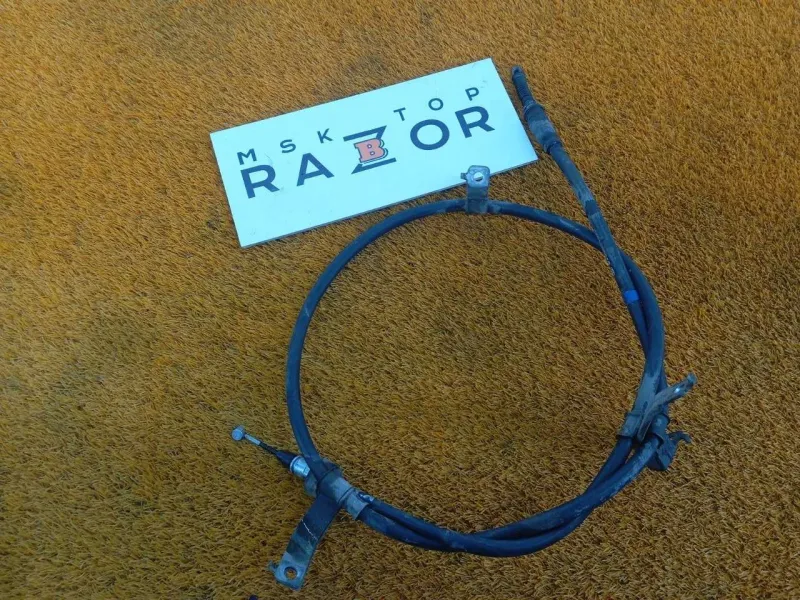 Трос стояночного тормоза