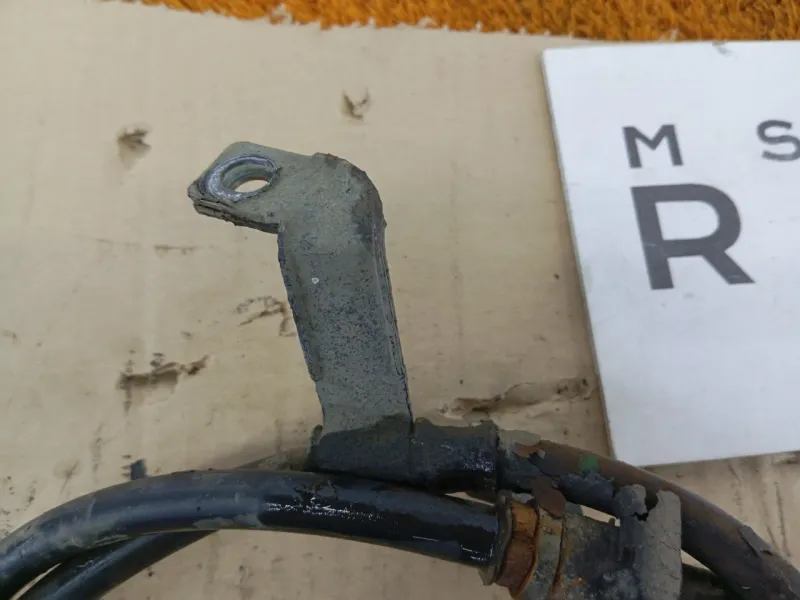 Трос стояночного тормоза