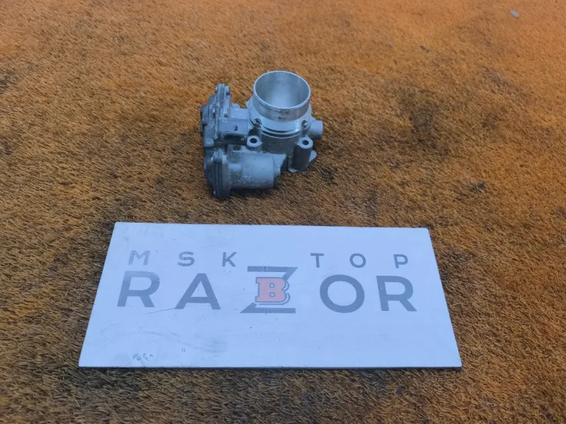 Дроссельная заслонка