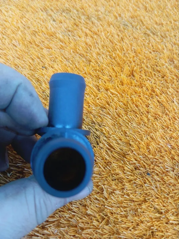 Тройник патрубков печки