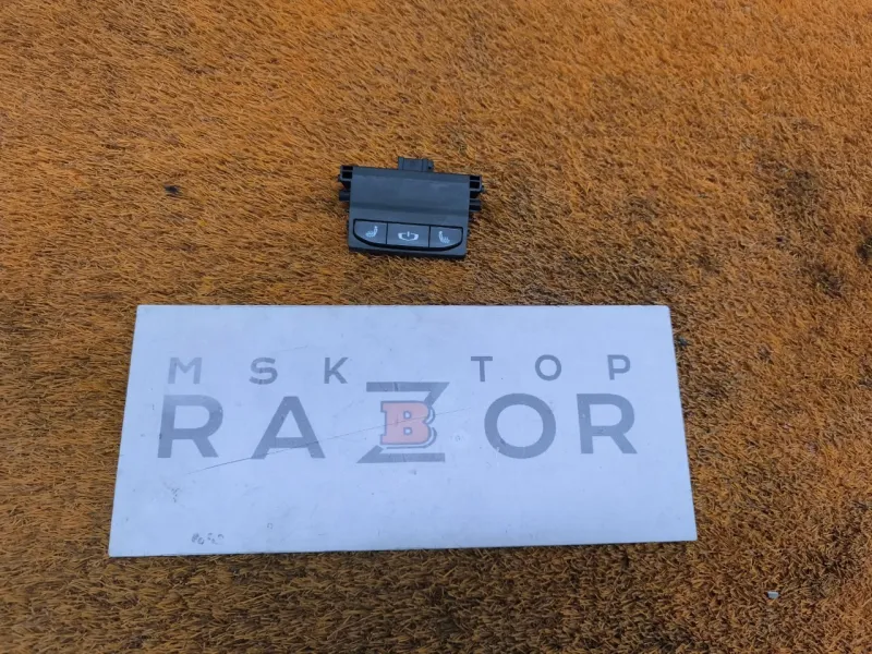 Кнопка обогрева сидений