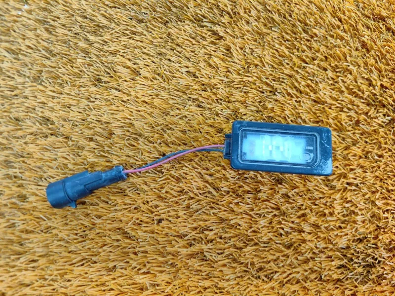 Фонарь подсветки номера