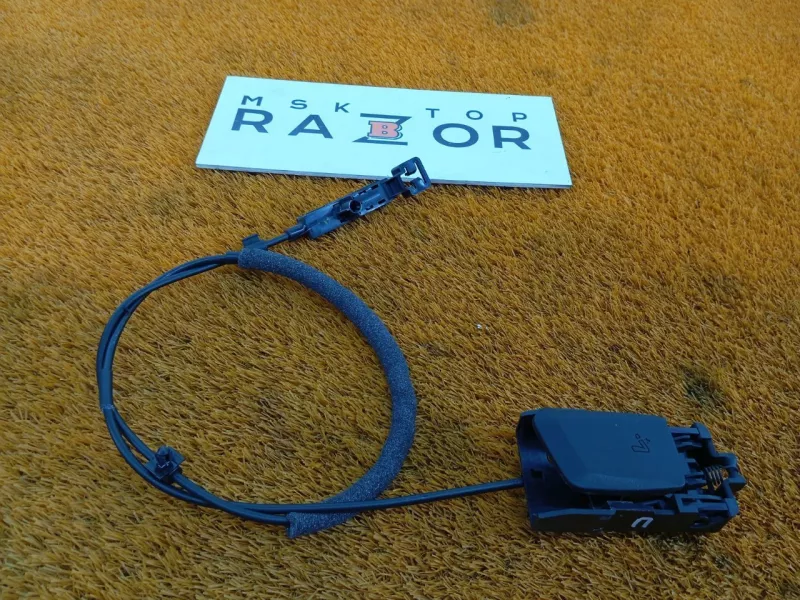 Ручка откидывания заднего сиденья