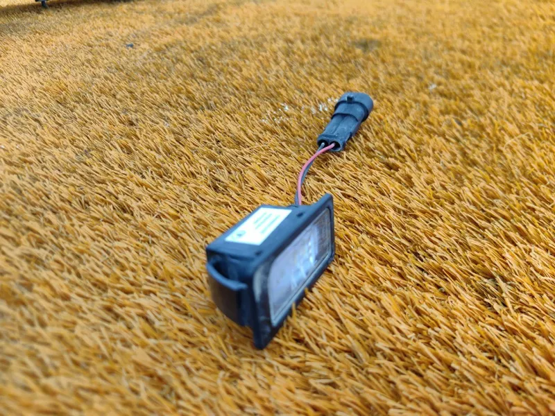 Фонарь подсветки номера