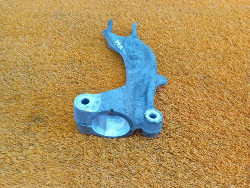 Крепление амортизатора