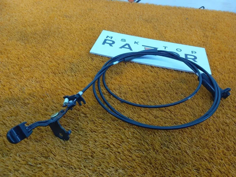 Трос лючка топливного бака