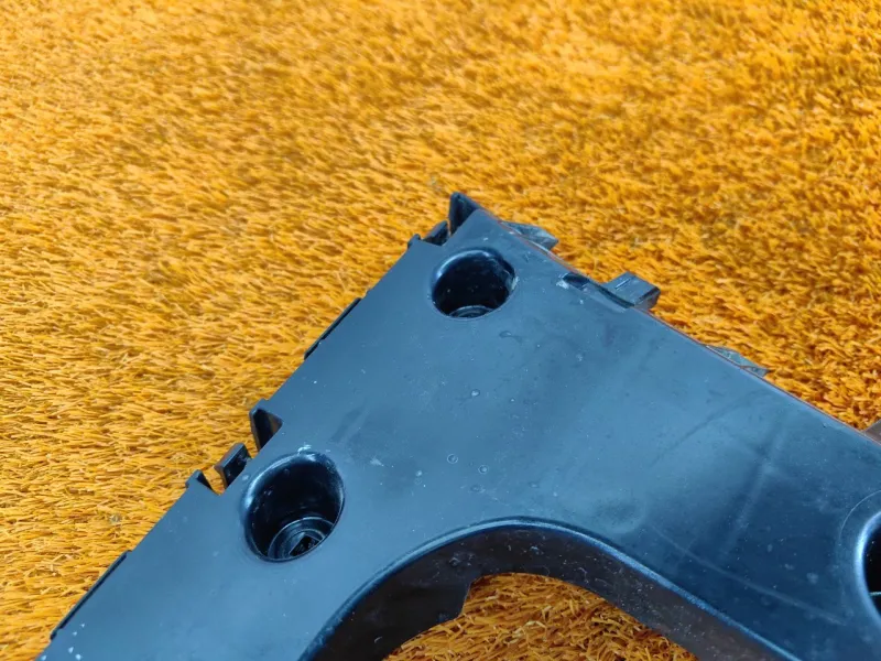 Кронштейн заднего бампера