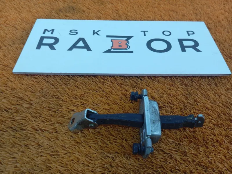 Ограничитель двери