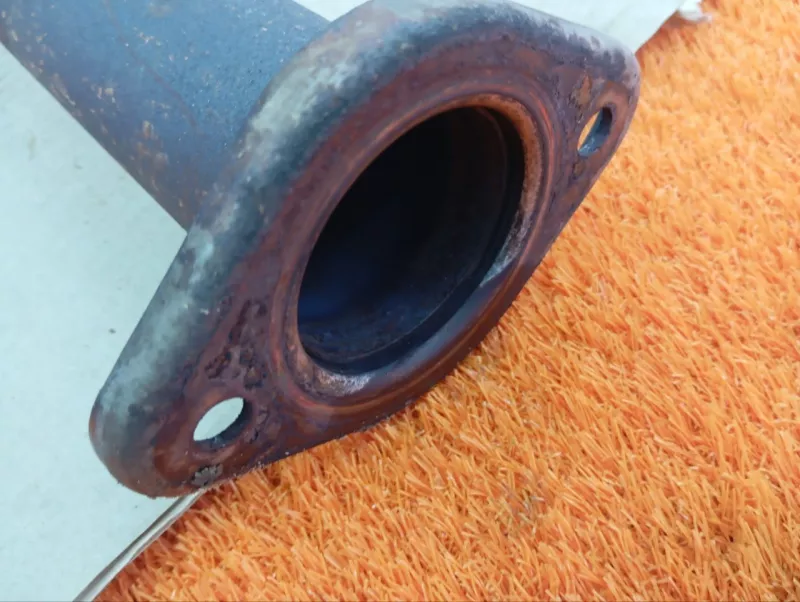 Приемная труба глушителя