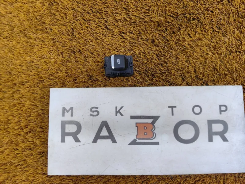 Кнопка стеклоподъемника