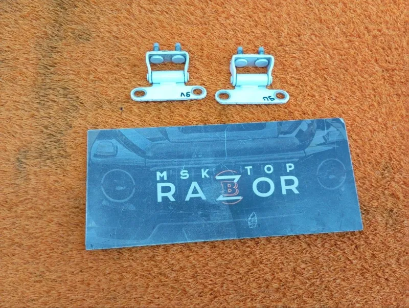 Петля двери багажника