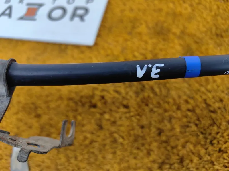 Трос стояночного тормоза