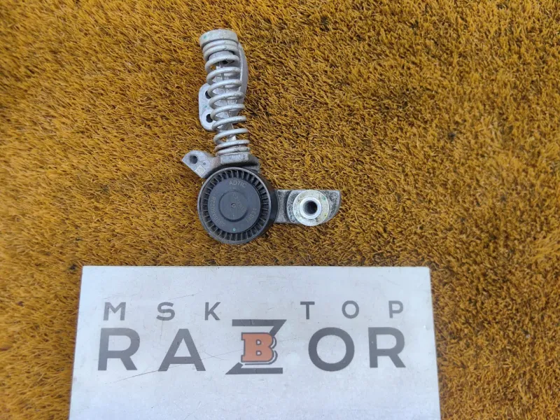 Натяжитель приводного ремня (Ролик натяжитель ремня)