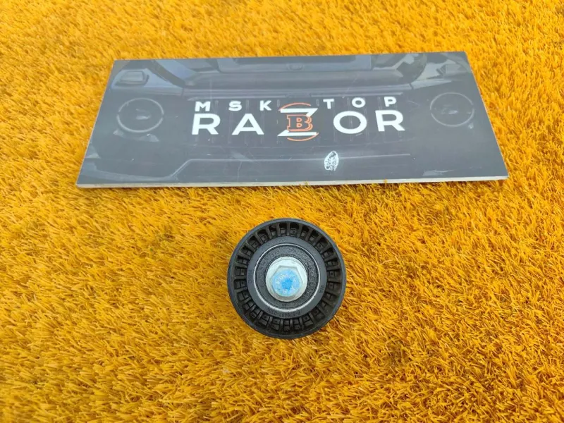 Ролик обводной навесного оборудования