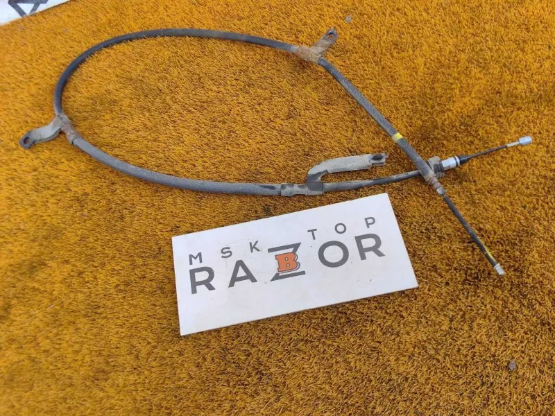 Трос стояночного тормоза