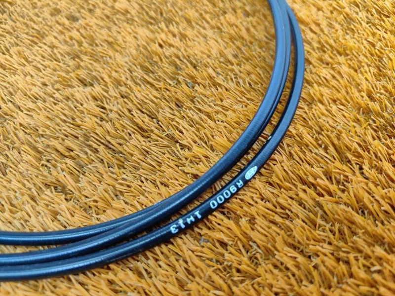 Трос лючка топливного бака